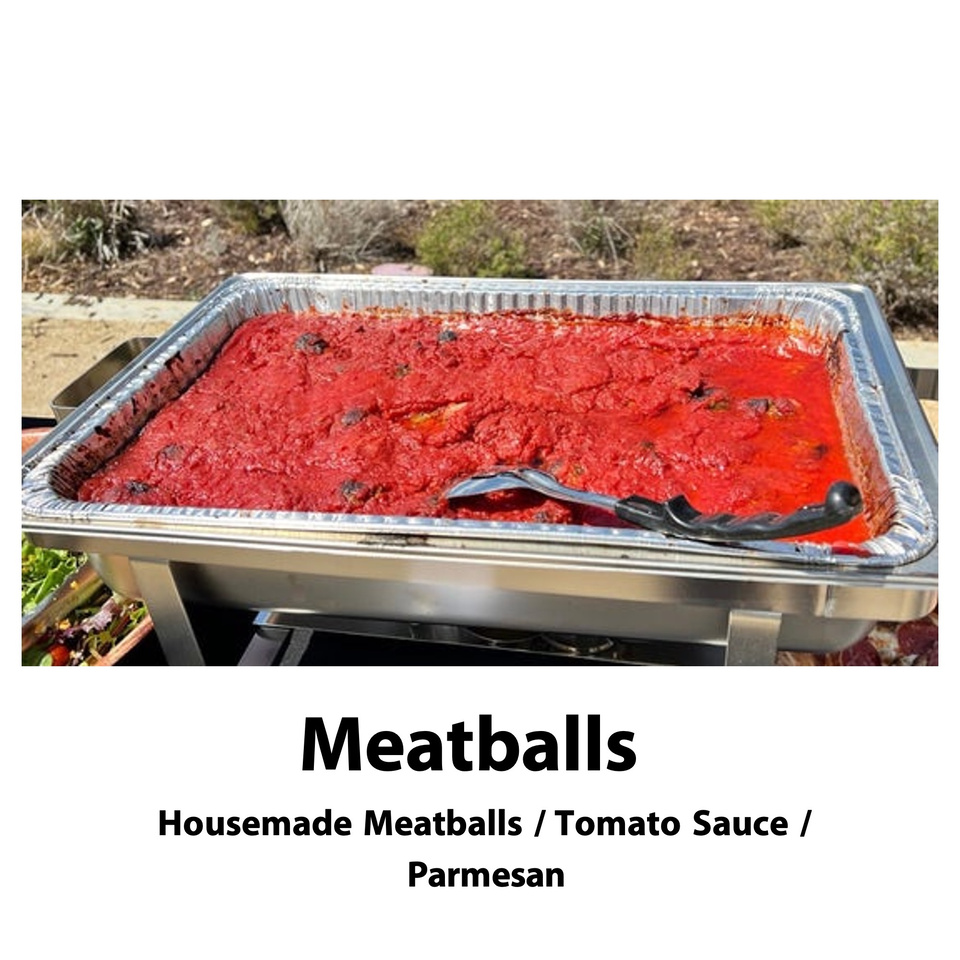 A large catering pan of Big Oven Pizza's meatballs in rich red tomato sauce with a serving spoon.