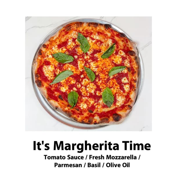 A Big Oven Pizza Margherita, topped with tomato sauce, mozzarella, Parmesan, and fresh basil.