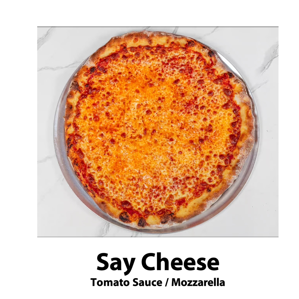 A whole cheese pizza with tomato sauce and mozzarella on a metal pan, on a white marble surface.